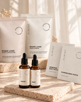 SLIMTOX Complete Journey Bundle with chocolate and vanilla protein powders, Slimming and Berberine Body Patches, and Ignite+ and Reset Drops.