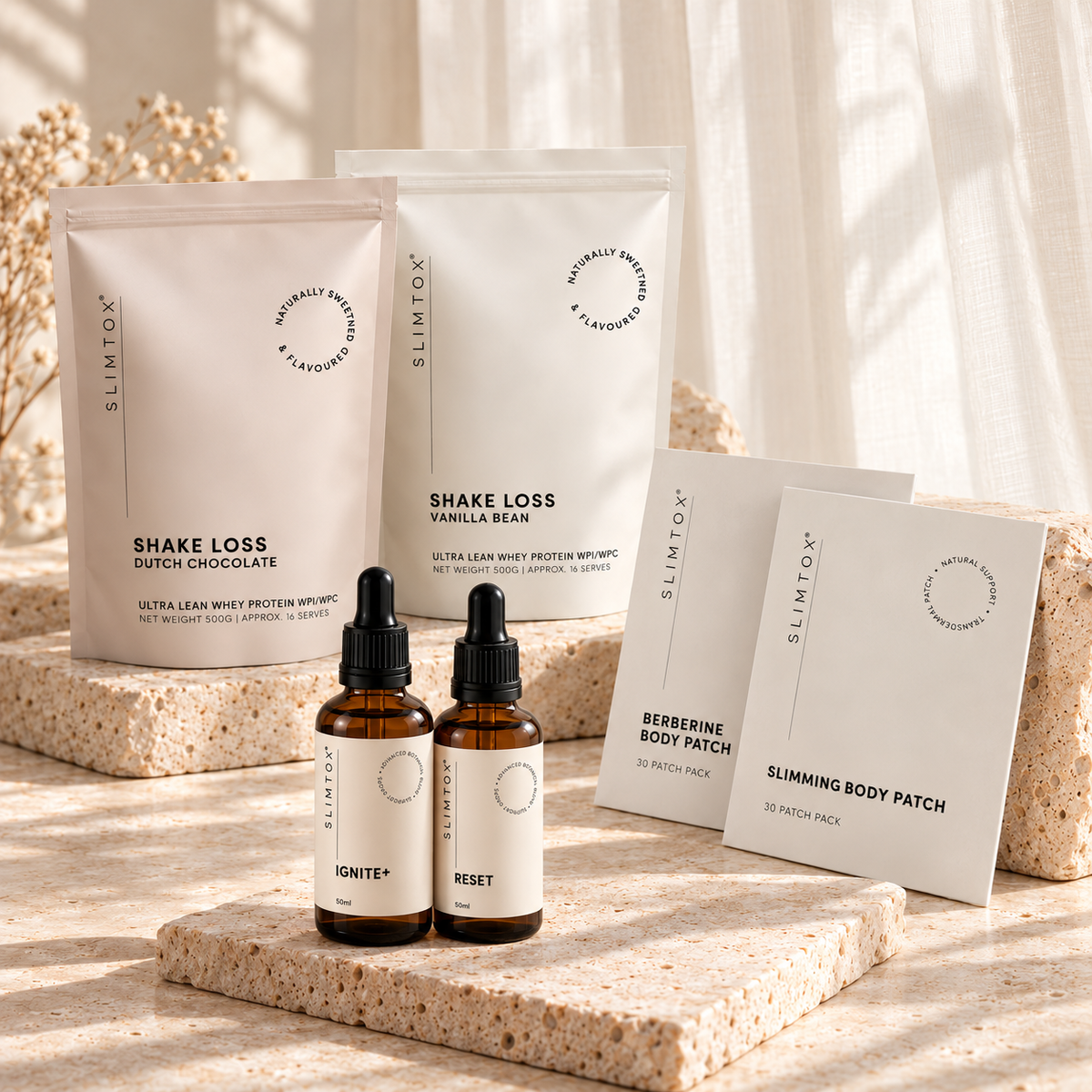 SLIMTOX Complete Journey Bundle with chocolate and vanilla protein powders, Slimming and Berberine Body Patches, and Ignite+ and Reset Drops.